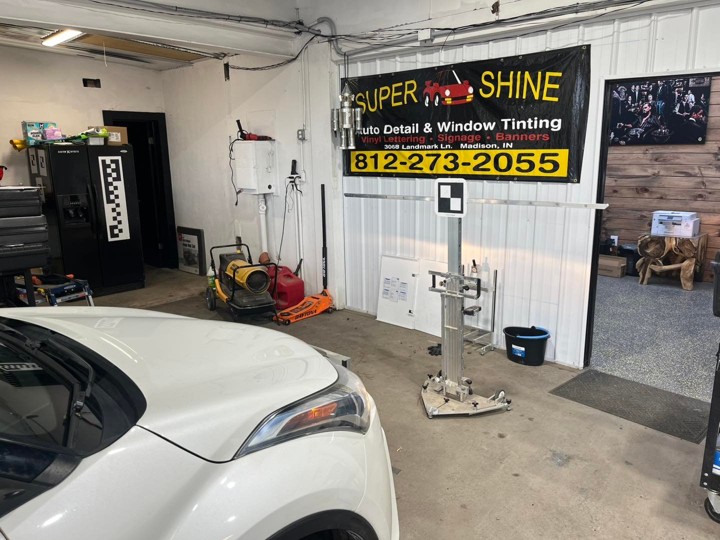Radar calibration equipment and targets positioned for precision aiming at B-Rite Autoglass
